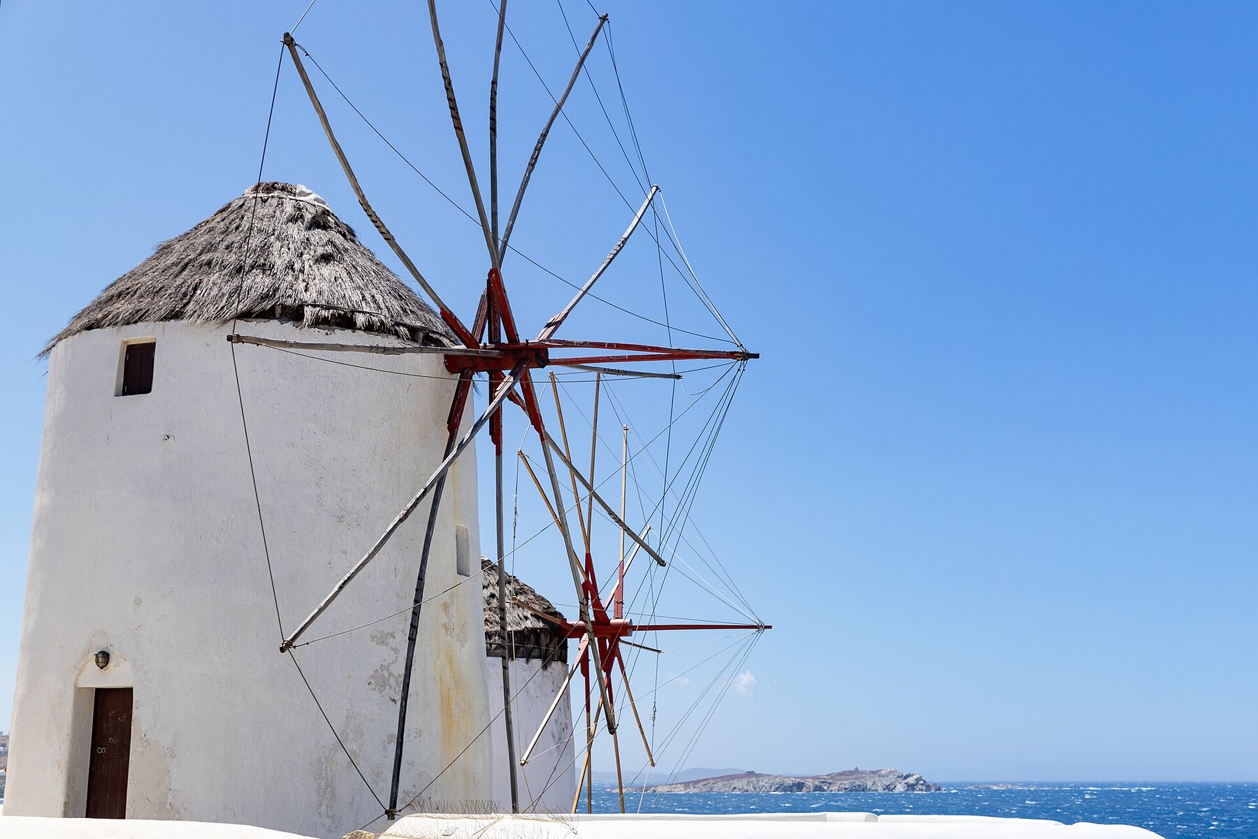 Mykonos windmills и island nightlife layer